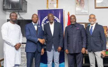 A group of men shaking hands