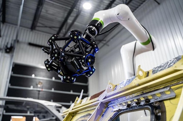 Using robots to move scanners for in-process inspection provides a convenient means to extend existing technologies, such as this MetraScan 3D-R from Creaform. Credit: Creaform