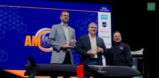 WATCH | AMUG 2026: A new city, the same community spirit, and the partnerships worth watching 2 keynote speakers receiving their award at AMUG 2026, award given by the MC, Todd Grimm on the picture as well