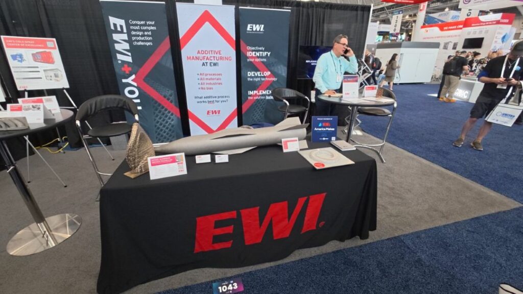 EWI booth and demonstration parts at RAPID+TCT 2026