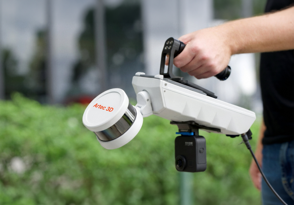 A hand holding Artec Jet, a SLAM-based mobile LiDAR system 