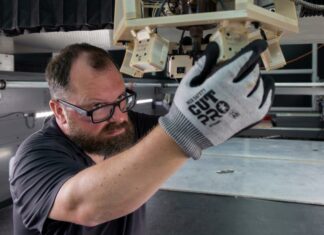 ORNL’s Kris Villez adjusts thermal cameras incorporated into a big-area 3D printer before testing a new technology for error recognition and correction. Credit: Alonda Hines/ORNL, U.S. Dept. of Energy
