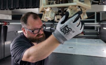 ORNL’s Kris Villez adjusts thermal cameras incorporated into a big-area 3D printer before testing a new technology for error recognition and correction. Credit: Alonda Hines/ORNL, U.S. Dept. of Energy