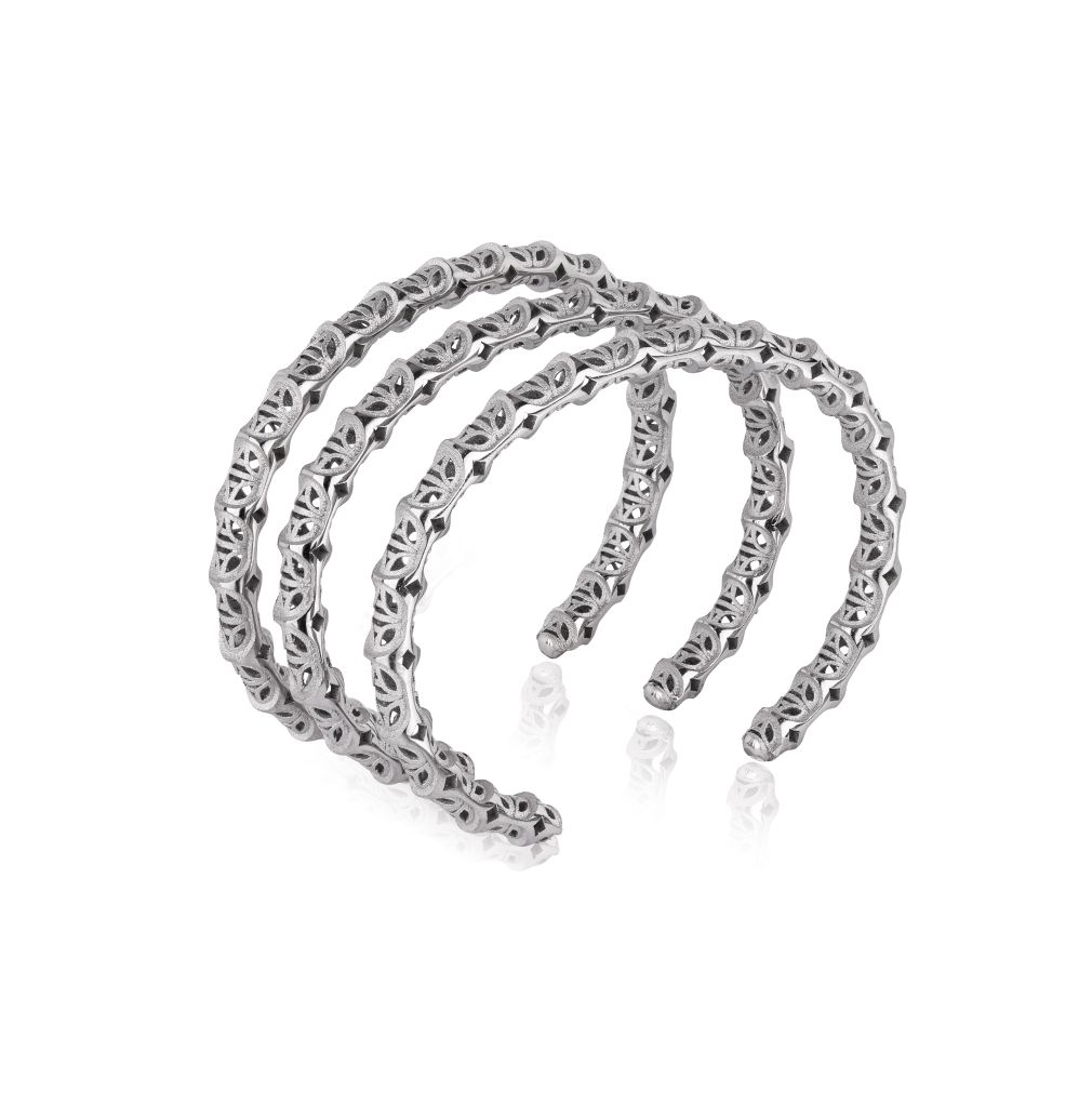 Legend: Platinum cuffs of the Dawn Prince. Credit: Maeve Gillies.
