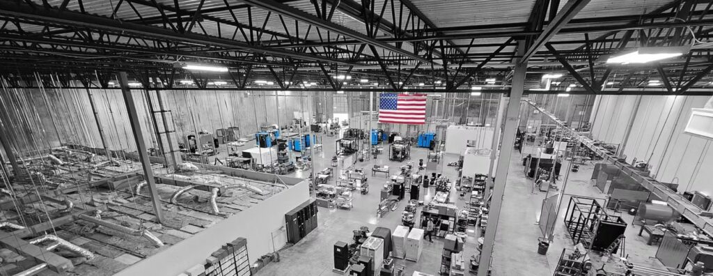 Industrial workshop with processing equipment at DSH Technologies.