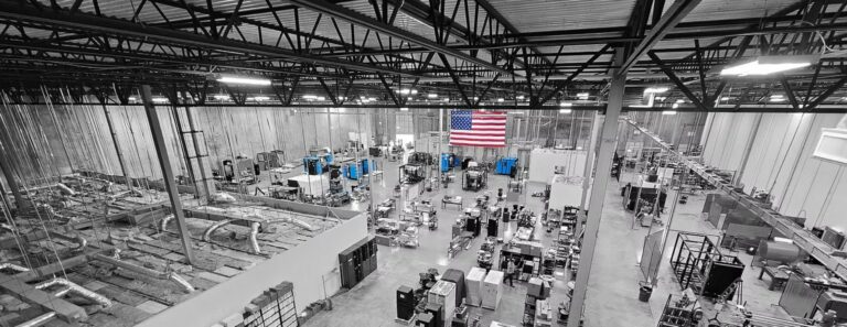 Industrial workshop with processing equipment at DSH Technologies.