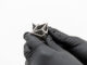 3D printed part held by hands with gloves