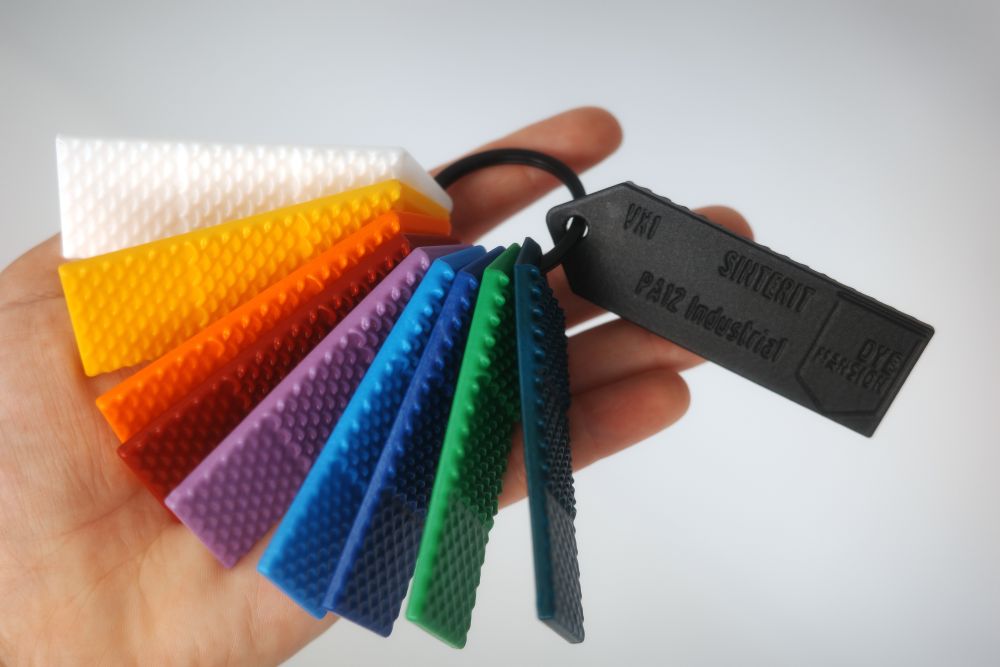 Fan of coloured and textured polymer samples.
