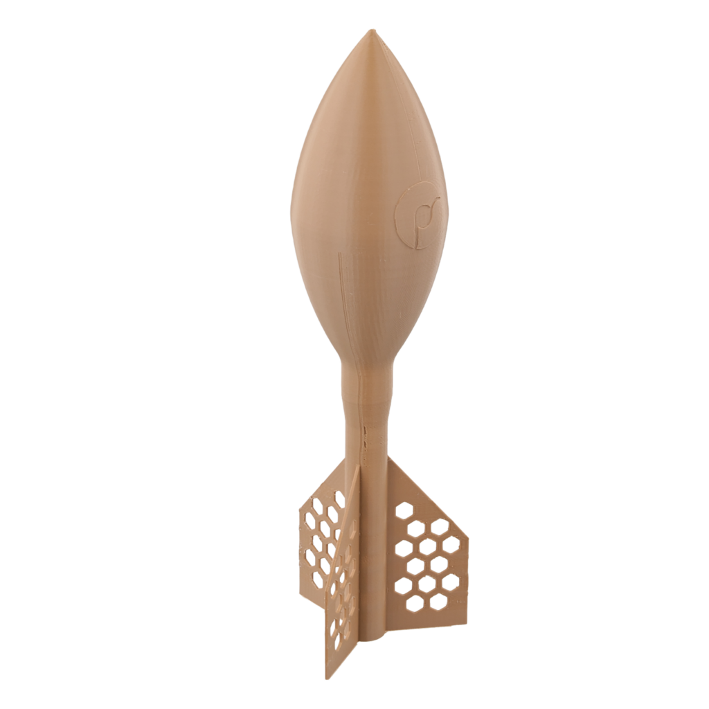Tan printed demonstration part with a pointed top and perforated lower section.