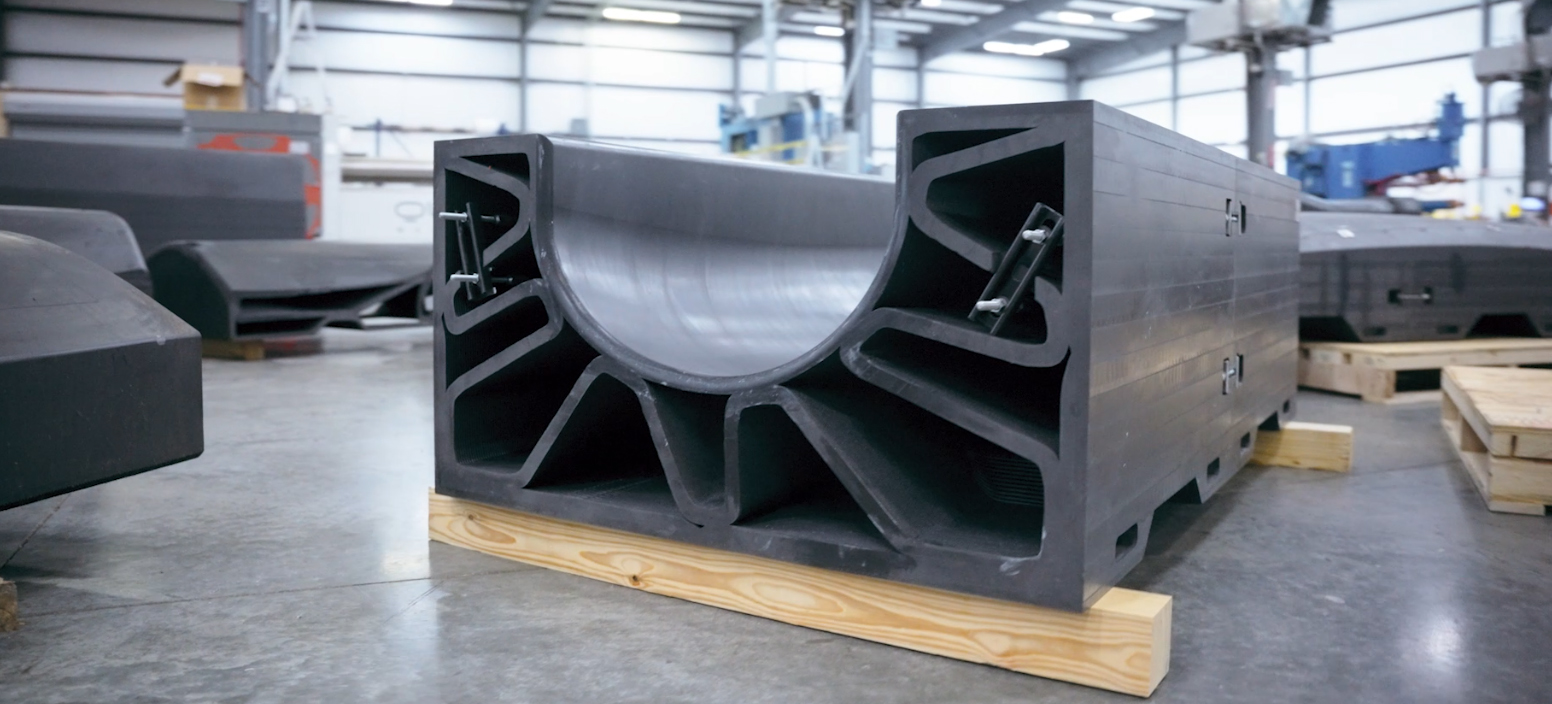 Large printed tooling with internal ribs resting on a pallet.