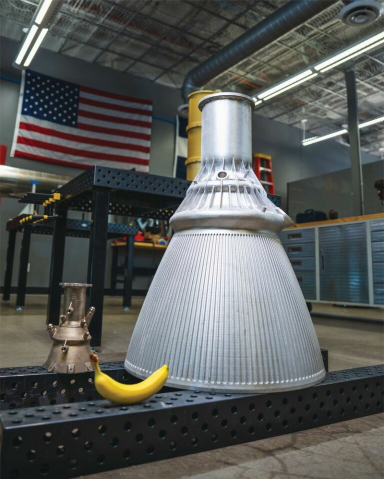 Serrano rocket engine displayed inside an industrial building.