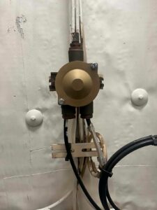An Aluminium Bronze Cover Box printed and machined using the UTK DARC & TNARNG SPEE3D Expeditionary Manufacturing Unit (EMU) reach back capability and then installed on the MV Asterix during RIMPAC 2026, an exercise organised by CAMRE NPS.