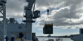 CAMRE NPS XSPEE3D Cold Spray metal 3D printer and SPEE3Dcell post-processing unit crane-lifted onto the MV Asterix for RIMPAC 2026.