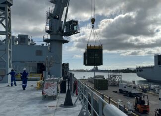 CAMRE NPS XSPEE3D Cold Spray metal 3D printer and SPEE3Dcell post-processing unit crane-lifted onto the MV Asterix for RIMPAC 2026.