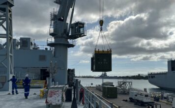 CAMRE NPS XSPEE3D Cold Spray metal 3D printer and SPEE3Dcell post-processing unit crane-lifted onto the MV Asterix for RIMPAC 2026.