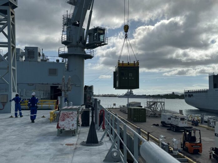 CAMRE NPS XSPEE3D Cold Spray metal 3D printer and SPEE3Dcell post-processing unit crane-lifted onto the MV Asterix for RIMPAC 2026.