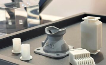 The first publicly displayed non-oxide ceramic components from Sinto Advanced Ceramics Europe GmbH at ESA Industry Space Days 2026: aluminum nitride sleeves (left), a silicon nitride hold-down component (center), and an aluminum nitride heat exchanger (right). © Sinto Advanced Ceramics Europe GmbH