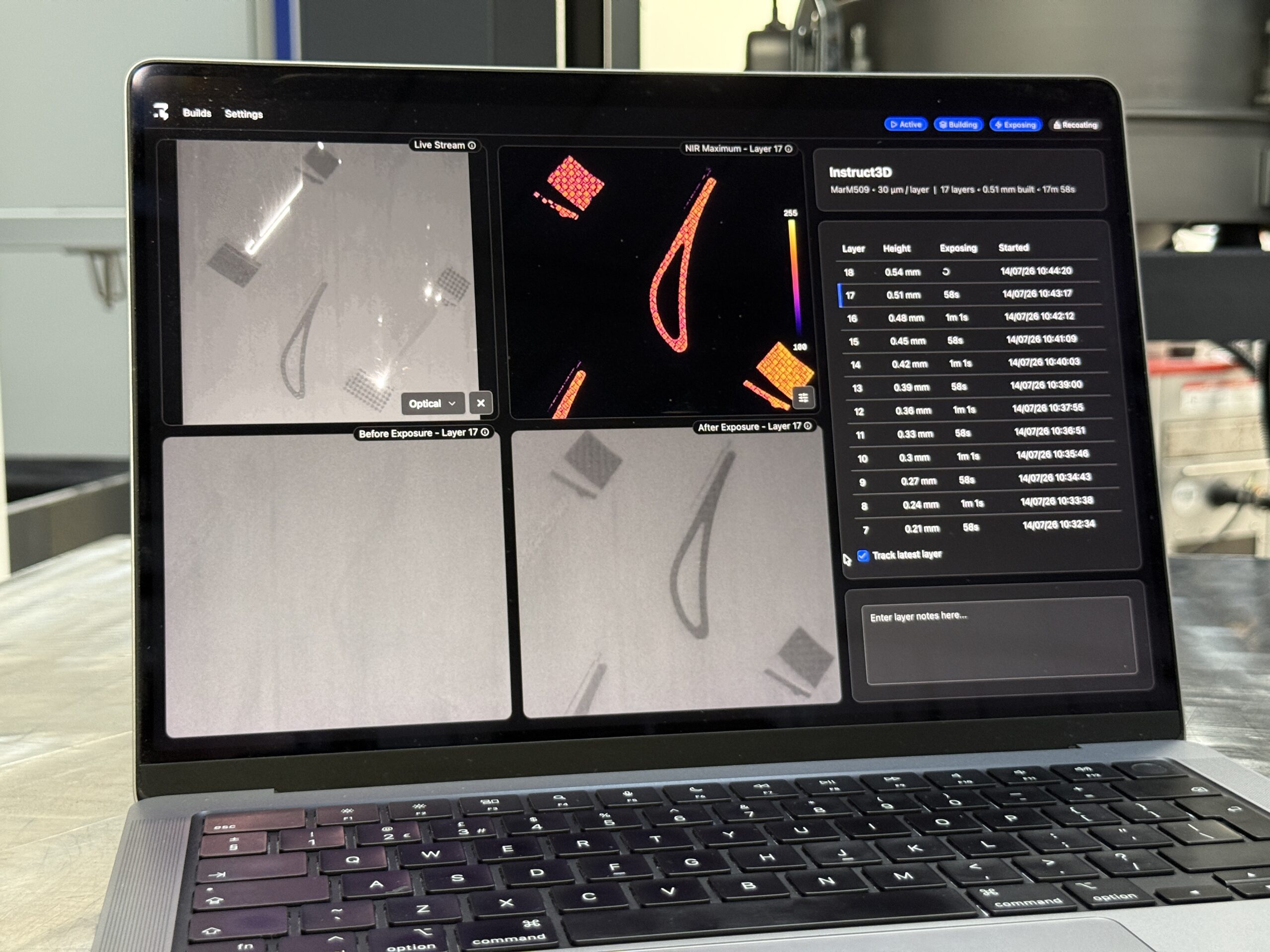 Laptop showing Instruct3D build monitoring images and layer data.